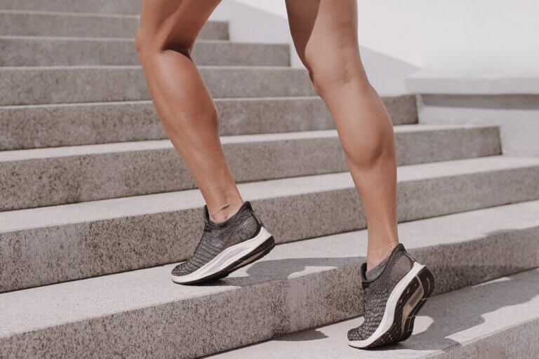 a person wearing running shoes