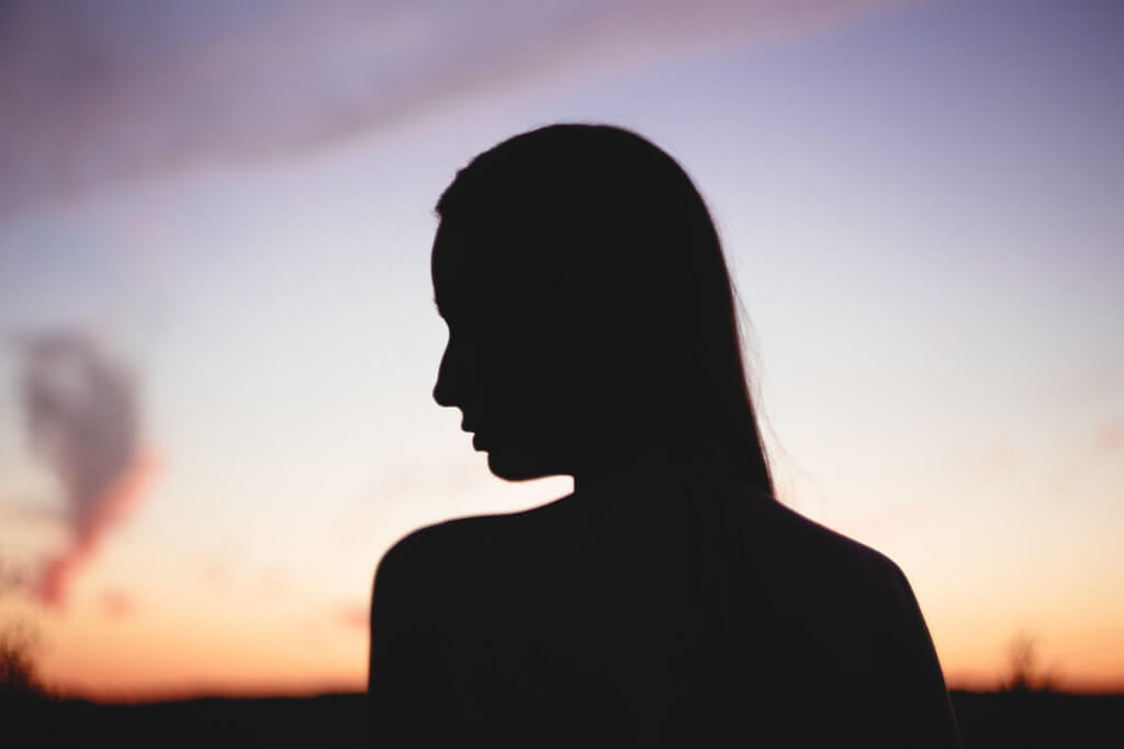 My eating disorder story, woman silhouette, sunrise